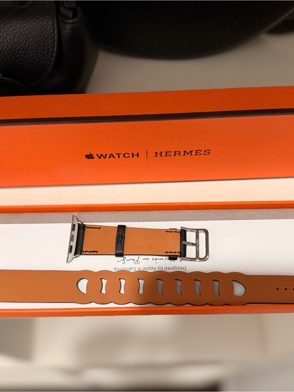 Apple Hermès Orange and Black Leather Watch Band
